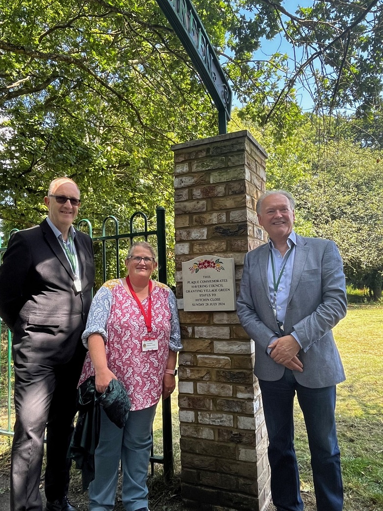 Councillor Ray Morgon, Councillor Katharine Tumilty and Councillor Graham Williamson with the new village green plaque