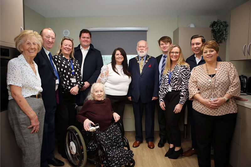 Mayor, Councillor John Mylod  (centre), with Councillor Damian White, Hugh Jeffrey and Dan Harrison, Wates Residential, and Councillor John Crowder in the newly refurbished kitchen by Cheryl Cable, the HAD team and service users.