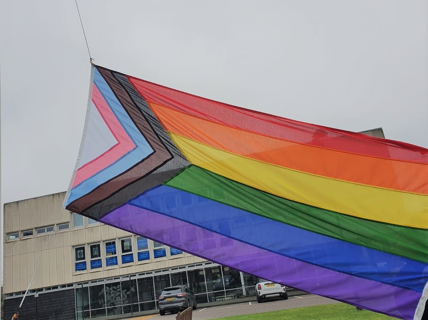 Progress Pride Flag being raised at Town Hall