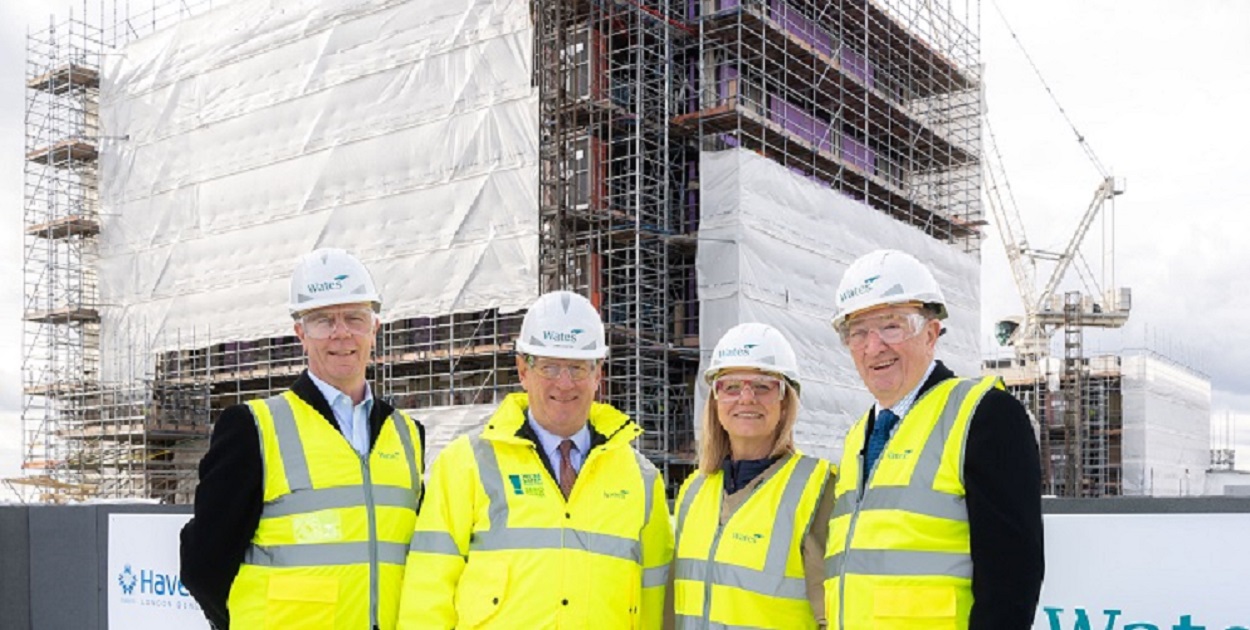 Neil Stubbings, Director of Regeneration, Sir James Wates, Chairman of Wates Group, Helen Bunch, Executive Managing Director of Wates Residential, and Councillor John Crowder, Cabinet Member for Regeneration, at the Napier and New Plymouth site