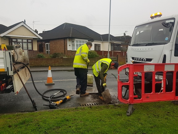 potholes being fixed by highways team