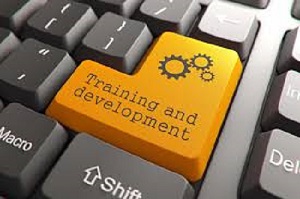 laptop keyboard says training and development